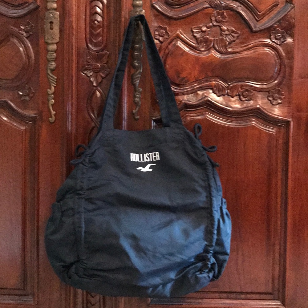 Purse/Bag - by Hollester. Dark Blue Color w/string